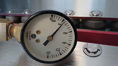 Gauge showing the low internal pressure during inspection.
